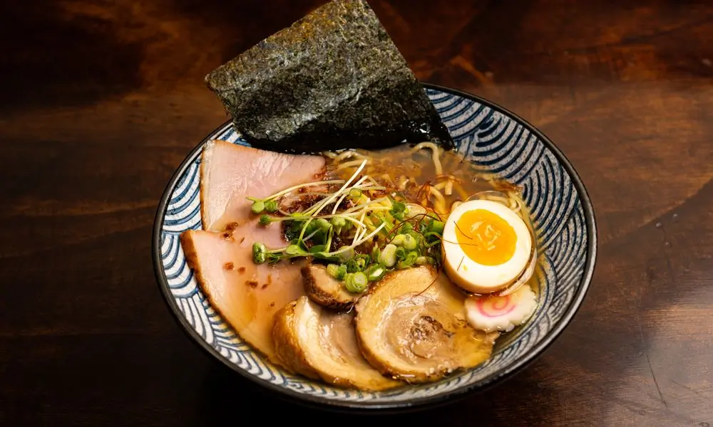 Clear ramen with scallion oil, pork & egg at The Noodle Smith, a Asian Restaurant in Cary